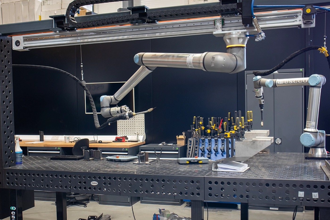 A Universal Robots collaborative robot arm working at a Siegmund fixturing table